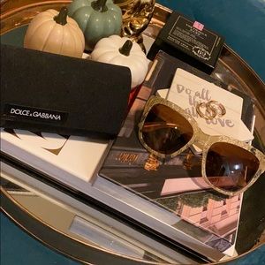 Dolce & Gabbana sunglasses.